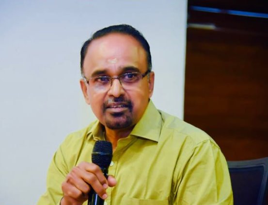 Dr. Ajayan G speaking at a medical program